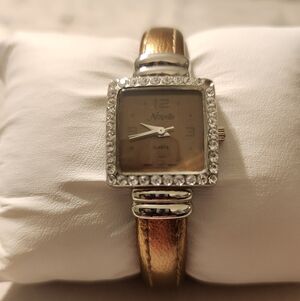 Novelle Women's Watch with Gold Strap and Silver Bezel